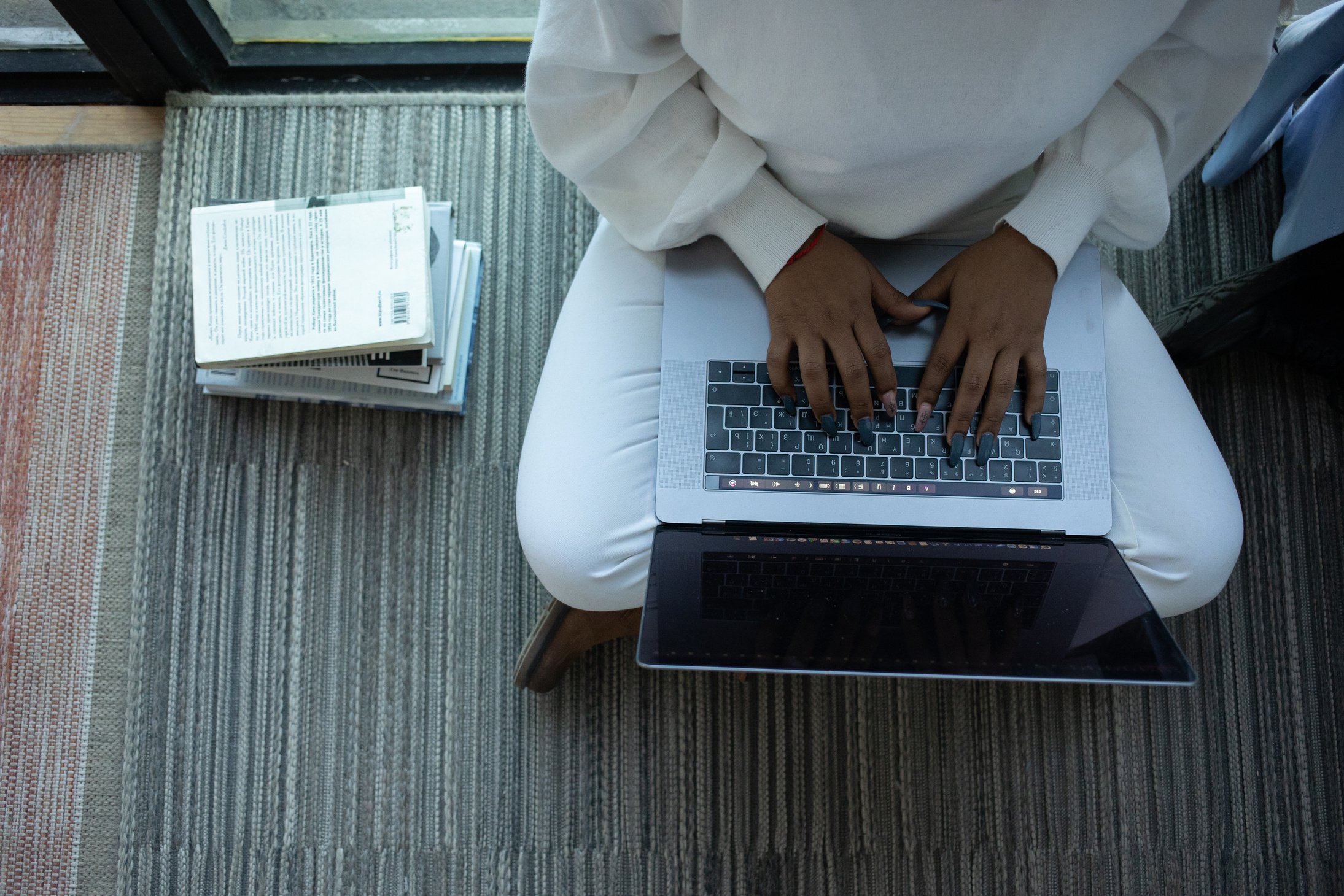 Black woman using laptop for studying